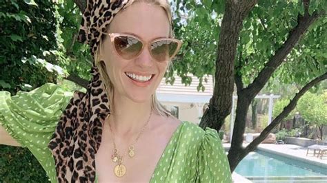 January Jones, 45, reveals her toned figure in a black string bikini ...